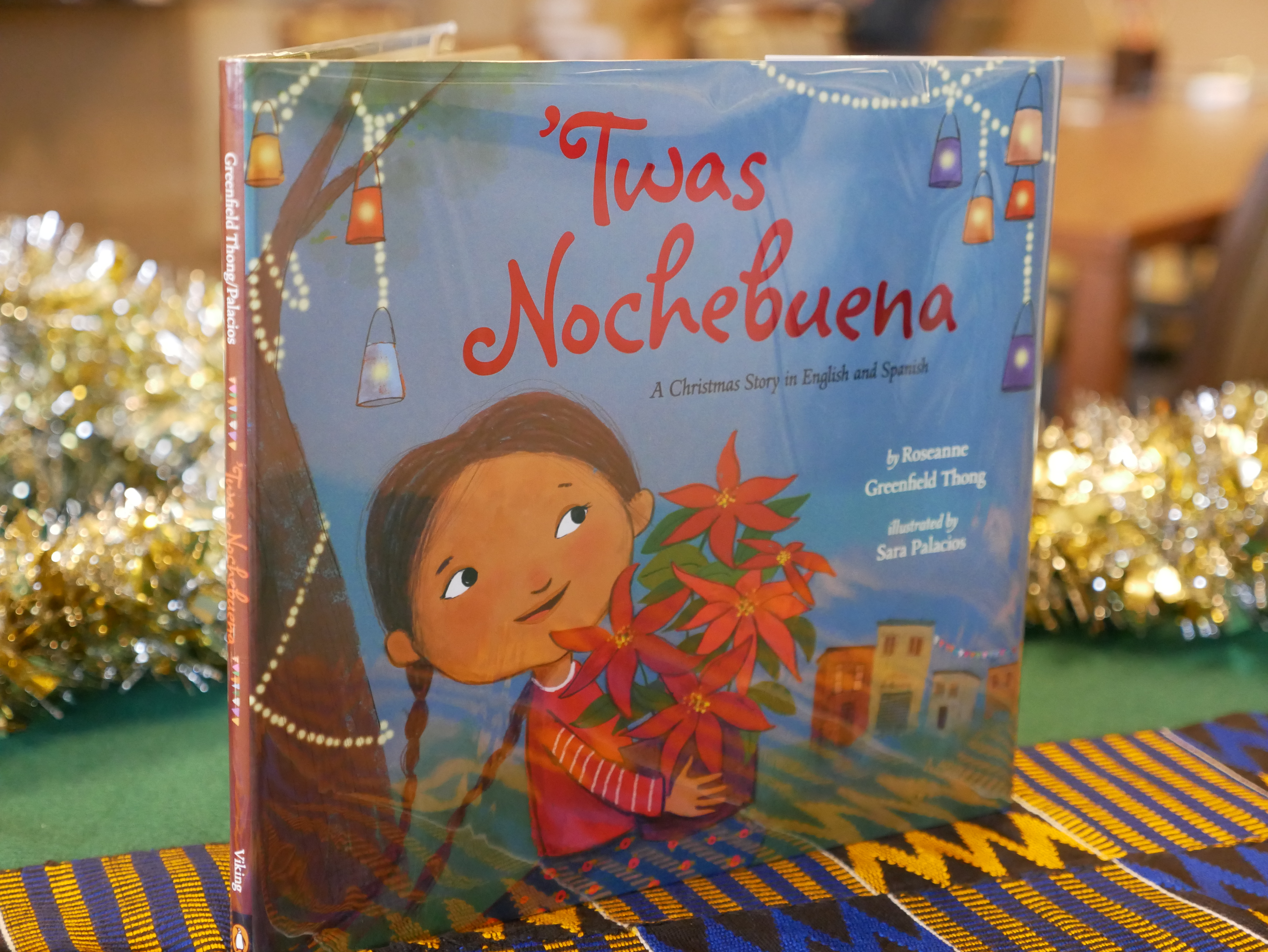 ‘Twas Nochebuena by Roseanne Greenfield Thong and Illustrated by Sara Palacios (Viking, 2014) PZ 8.3 .T328 Tw 2014 Written in English with Spanish words - retelling of ‘Twas the Night Before Christmas