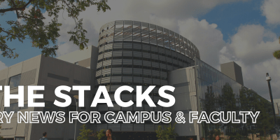 In the Stacks - Library stands against backdrop of clouds