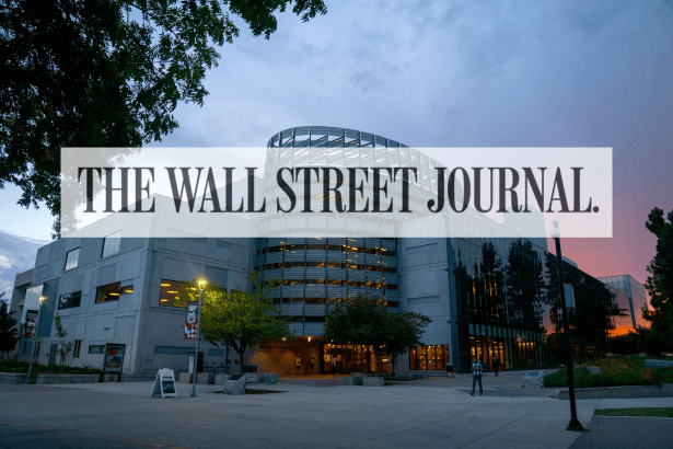 photo of the library against a fading sunset. "Wall Street Journal" is printed across the photo