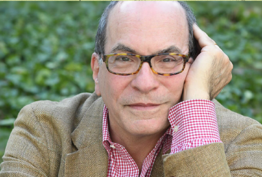 Leonard Marcus looks directly into the camera for a portrait